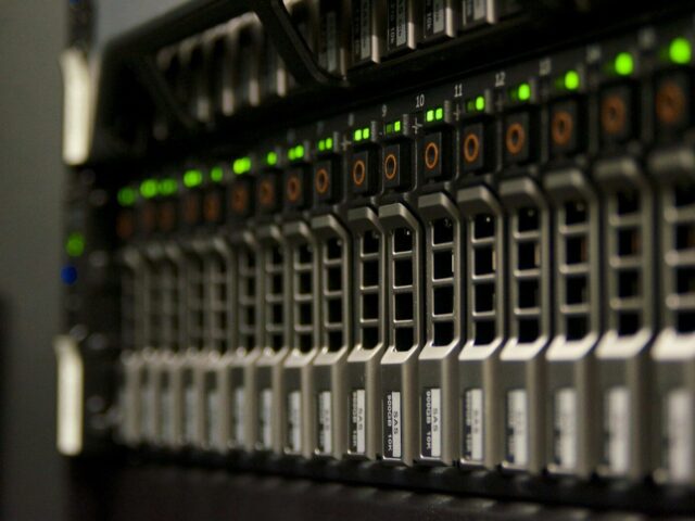 Server rack with blinking green lights